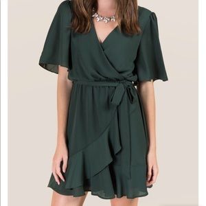 Francesca’s hunter green colored dress size L